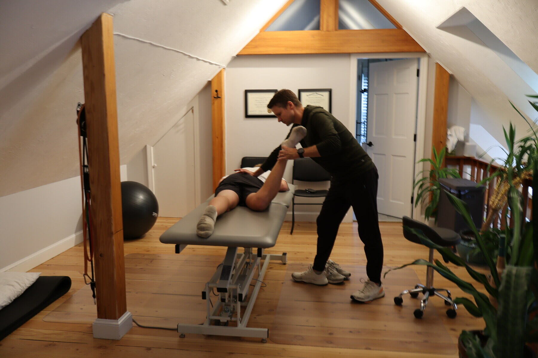 Hands-on physical therapy treatment in the private treatment room